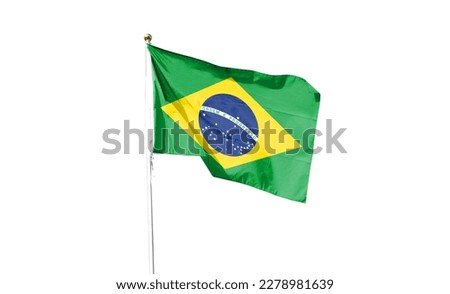 Brazilian flag in the cloudy sky. waving in the sky Royalty-Free Stock Photo #2278981639