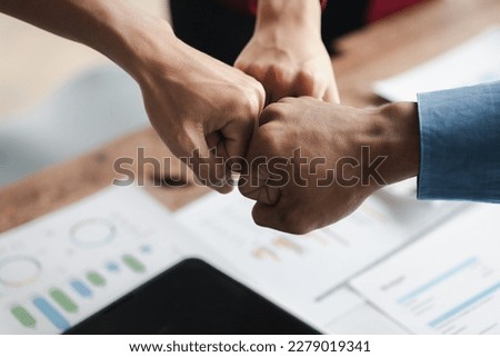 Coordination of the startup management team, businessmen joint venture start up companies, they are young entrepreneurs start up companies. up together to manage a plan to make the company profitable. Royalty-Free Stock Photo #2279019341