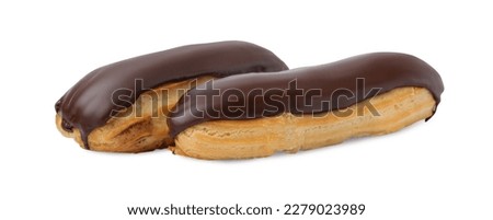 Delicious eclairs covered with chocolate isolated on white Royalty-Free Stock Photo #2279023989
