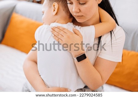 a family talking together. a mother supports her son in a difficult situation. The love of mother and son. People's way of life. Royalty-Free Stock Photo #2279024585