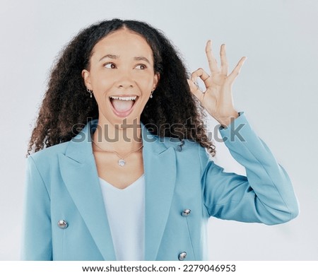 Woman, okay sign and wow face in studio for agreement, support and success. Excited female person thinking and hand gesture emoji for thank you, sale or agreement isolated on a white background
