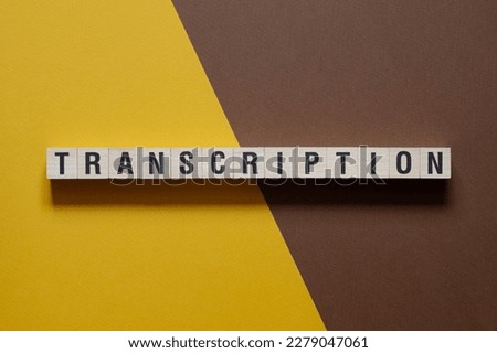 Transcription - word concept on cubes Royalty-Free Stock Photo #2279047061