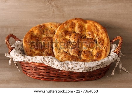 Ramazan Pidesi  is a traditional soft leavened Turkish bread for Ramadan Royalty-Free Stock Photo #2279064853