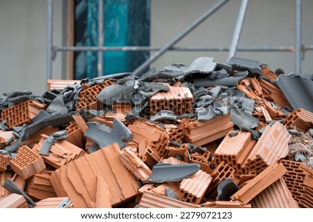 Rubble on construction site in front of home