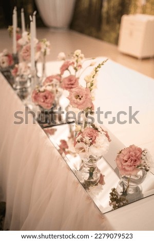 Luxury, elegant wedding reception table arrangement, floral centerpiece. Wedding day.