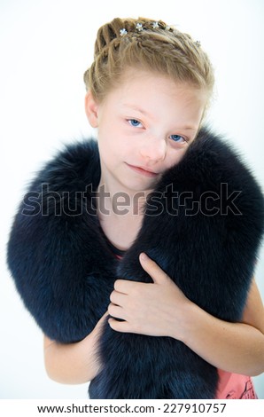 girl in a fur coat. winter 