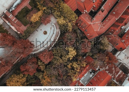 Get a Bird's Eye View of the Streets of Zagreb, Croatia's Capital City with our Aerial Photography. Our Top-Down Shot captures the vibrant energy and colorful beauty of the city's streets, architectur