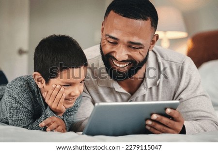 Dad, son and bed with tablet for bonding, love and streaming movies on web app with happiness. Man, kid and bedroom in family home with mobile touchscreen ux for gaming, e learning and relax together