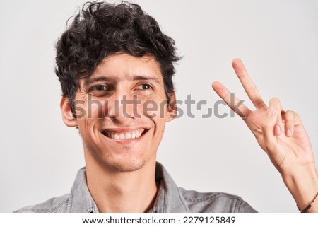 Young man with strabismus smiling positively at the camera. Royalty-Free Stock Photo #2279125849