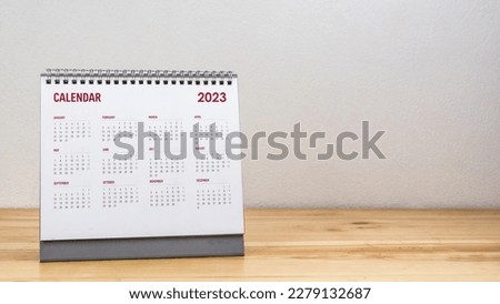 Calendar year 2023 schedule on wood table white background.
2023 calendar planning appointment meeting concept. copy space.