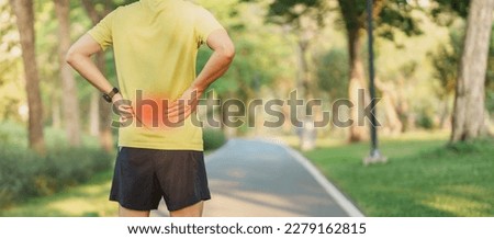 adult male with her muscle pain during running. runner man having back and Waist body ache due to Piriformis Syndrome, Low Back Pain and Spinal Compression. Sports injuries and medical concept Royalty-Free Stock Photo #2279162815