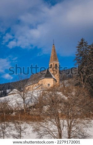 Small church in St. Magdalena or Santa Maddalena in Geislergruppe or Gruppo dele Odle Italian Dolomites Alps mountains. January 2023 Royalty-Free Stock Photo #2279172001