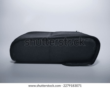 Black colored bag for flash light