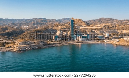 Aerial photo from drone to Penon del Cuervo beach, The Rock of the Raven and Playa la Fabrica cement factory.Malaga, Costa del sol, Andalucia ,Spain (series)