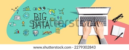 Big data theme with person using a laptop computer
