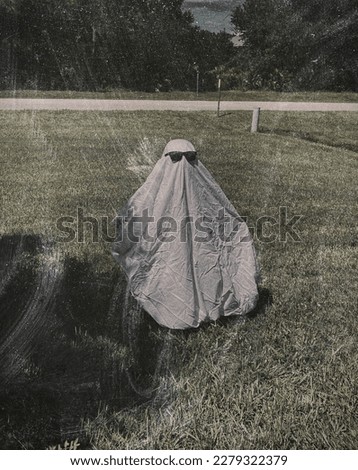 Dress up ghosts in yard