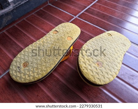 flip-flops lying on the floor