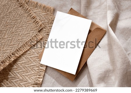 Elegant classic minimalist business branding template, blank paper card with mock up copy space on a warm neutral beige background