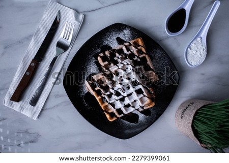 plate of asian waffles with ice cream