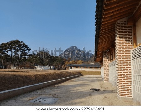 a picture of a distant mountain  View from an old royal palace in South Korea