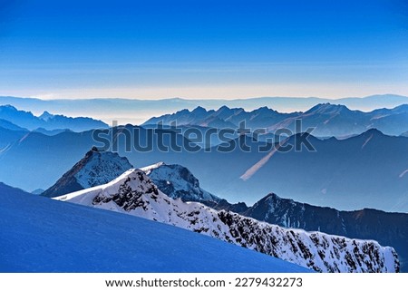 
nice photo of snow covered mountains