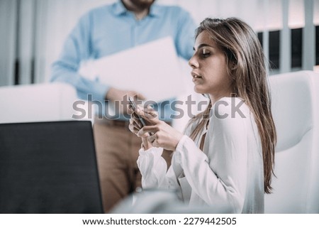 Workplace Bullying. Young ambitious male boss humiliating young women at workplace, gender discrimination at work. Psychological abuse. Royalty-Free Stock Photo #2279442505