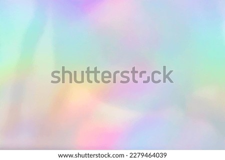 Abstract blur holographic rainbow foil iridescent background Royalty-Free Stock Photo #2279464039