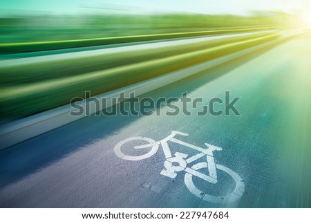 Bicycle sign on the road  in public park