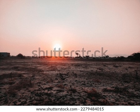 Sunset photography while traveling on bike, beautiful picture of sunset, road trip, cars picture while sunset and nature picture. Pictures contains bike, car and old building and sunset.