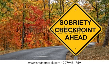 Sobriety Checkpoint Ahead Caution Sign - Autumn Background Royalty-Free Stock Photo #2279484759