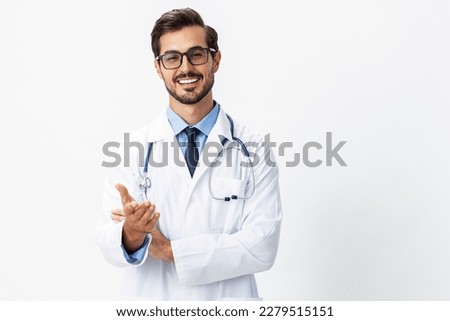 Man portrait of a doctor wearing a white coat and eyeglasses and a stethoscope looking into the camera on a white isolated background, copy space, space for text, health Royalty-Free Stock Photo #2279515151
