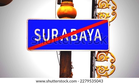 highway signs that notify road users have left the city of Surabaya