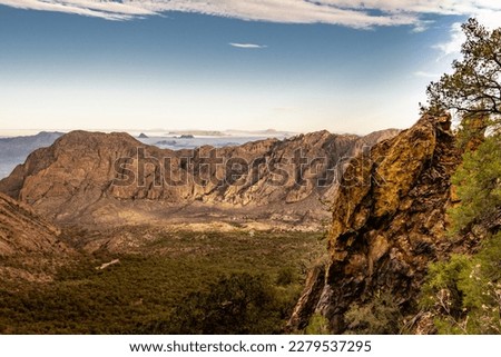 Moss Grows On Cliff Overlooking Chisos Basin in Big Bend National Park Royalty-Free Stock Photo #2279537295