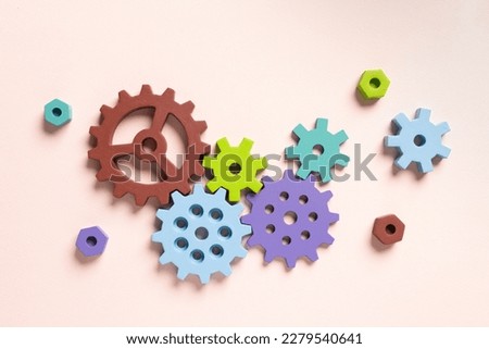 Top view of colorful gears. Corporate work and modern business process concept. High quality photo Royalty-Free Stock Photo #2279540641