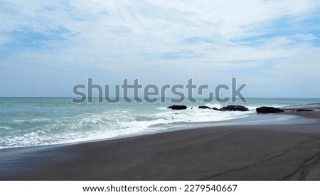 Bali Black sand beach in the evening