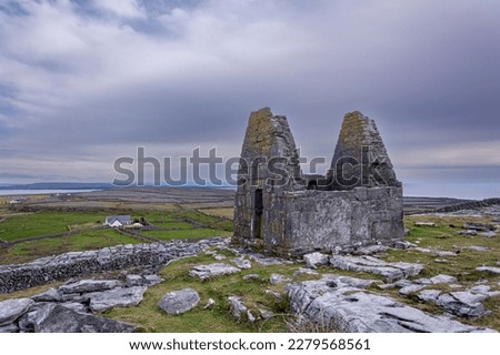 View from uphill with the smallest church in Europe towards the shore at Inishmore, Ireland