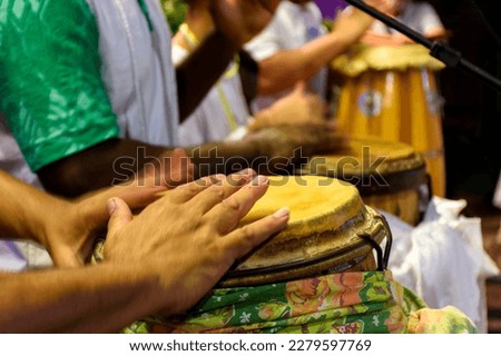 Drums called atabaque in Brazil being played during a ceremony typical of Umbanda, an Afro-Brazilian religion where they are the main instruments Royalty-Free Stock Photo #2279597769