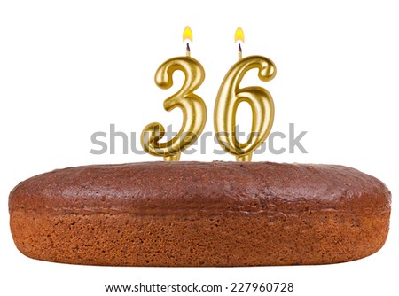 birthday cake with candles number 36 isolated on white background