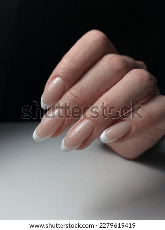 french manicure classic nail design Royalty-Free Stock Photo #2279619419