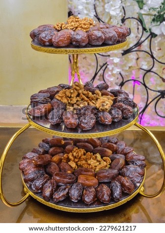 Traditional Moroccan stuffed dates with Dulce de leche and almonds served with milk
