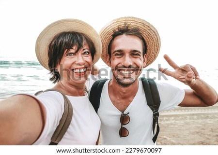 Mom and son taking selfie outside - Happy family celebrating mother's day together Royalty-Free Stock Photo #2279670097