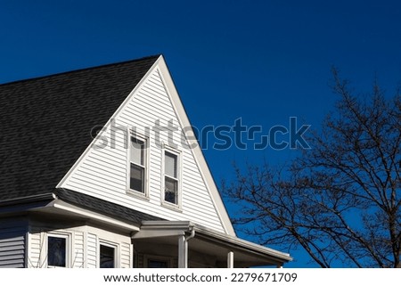 Single family house attic window, Boston, Massachusetts, USA Royalty-Free Stock Photo #2279671709