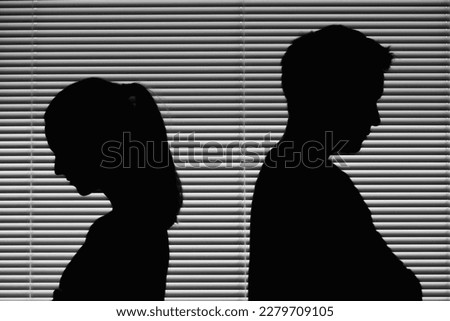 Negative emotions of couples concept. Husband and wife upset emotional couple having an argument quarrel	 Royalty-Free Stock Photo #2279709105