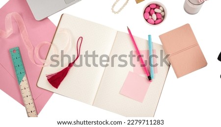 Image of make it your spot text on memo note over laptop and office items on white background. national clean your desk day concept digitally generated image.