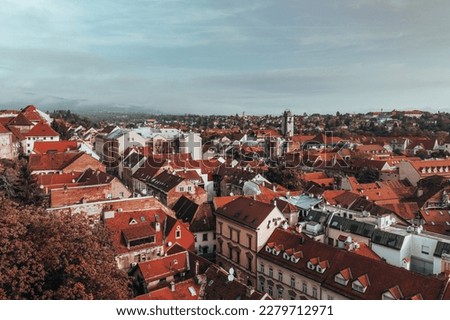 Discover the Vibrant Colors and Rich History of Zagreb, Croatia's Capital City in Autumn with our Stunning Photography. Our high-angle shot captures the city's picturesque fall scenery.