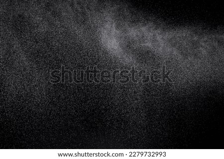 Million of Star Dust, Photo image of falling down shower rain snow, heavy snows storm flying. Freeze shot on black background isolated overlay. Spray water fog smoke as star particle on wind Royalty-Free Stock Photo #2279732993