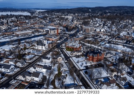 Aerial view of Laconia, New Hampshire in winter Royalty-Free Stock Photo #2279739333