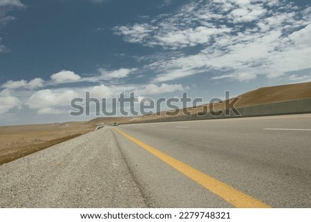 a long highway in a dry land