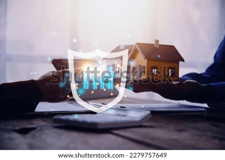 Businessman with protective gesture and family, life, health and house insurance icons. Insurance concept, Family life insurance and policy concepts. Royalty-Free Stock Photo #2279757649