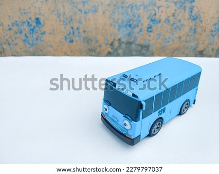 Kids toy. Tayo, blue little bus. Bus miniature
